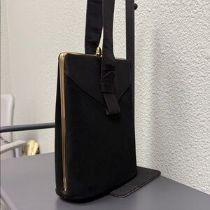 Chic Black Velvet Handbag with Gold Trim